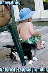 funny pictures baby sitting is not what your cat had in mind