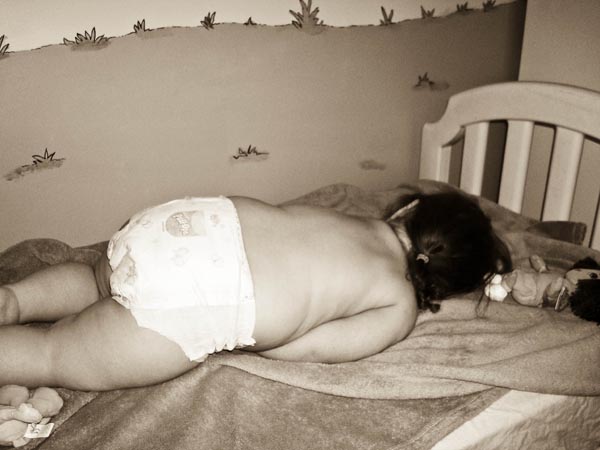 Ava sleeping in her new big girl bed